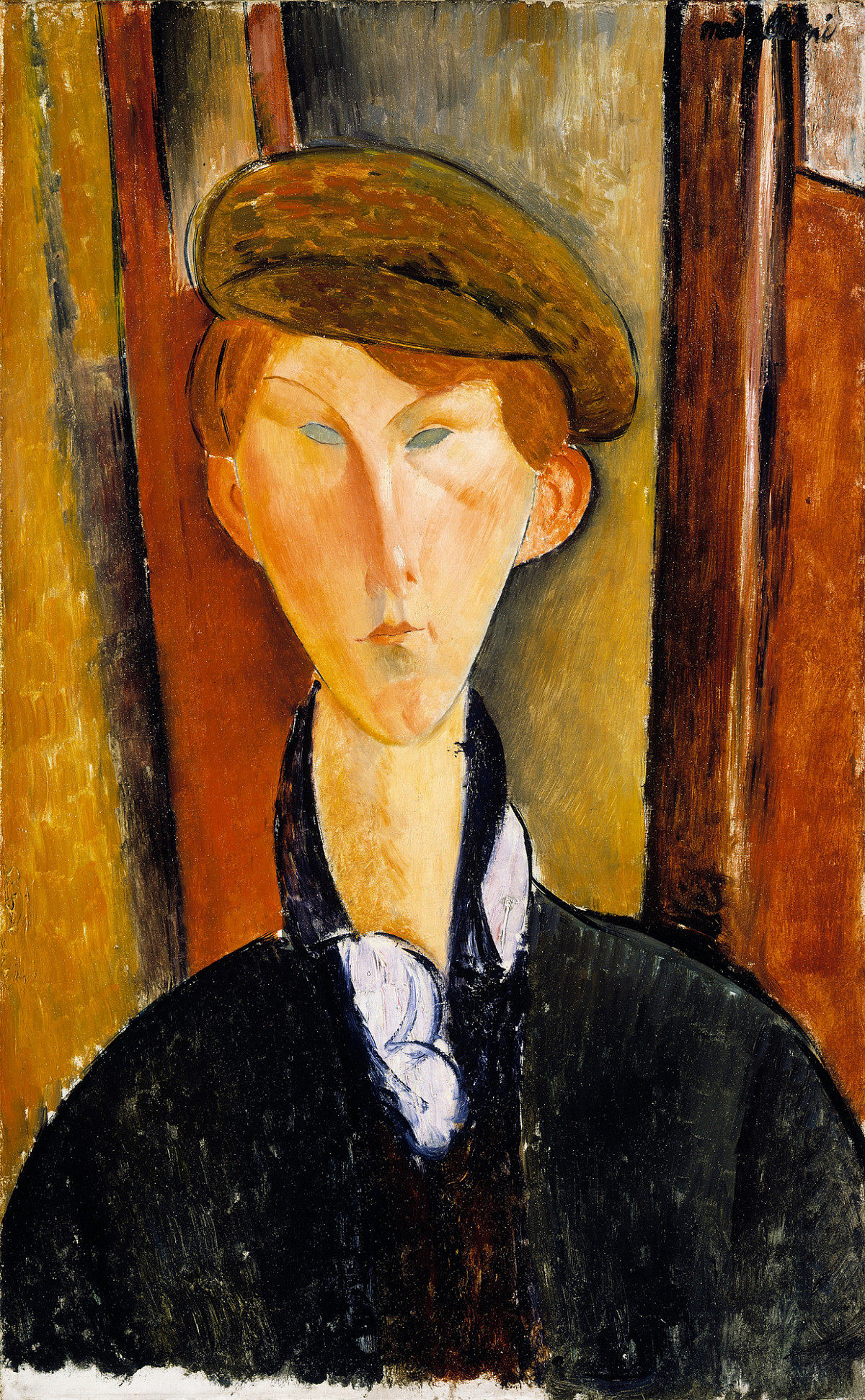 Portrait of a young man with a cap