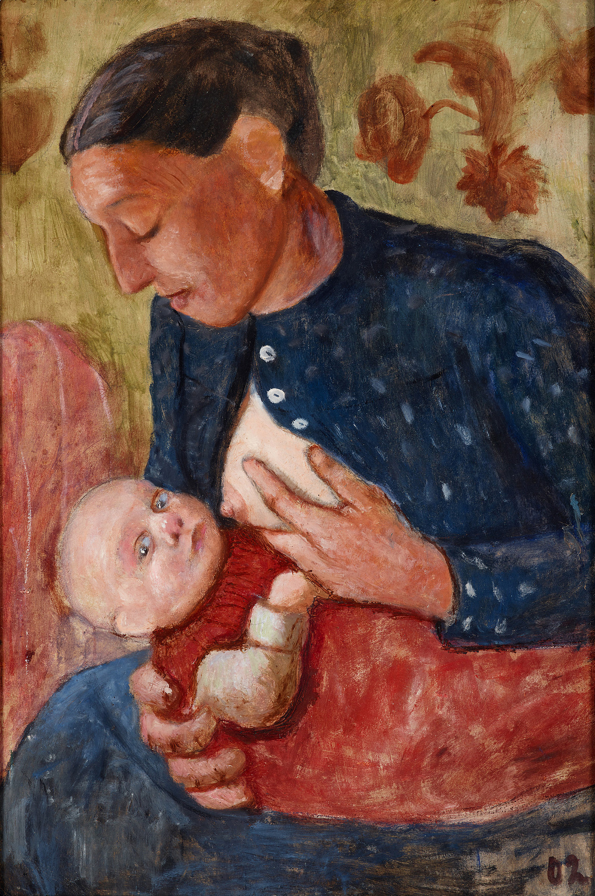 A seated woman wearing an unbuttoned blue blouse looks down at her baby. She holds her baby in one hand and offers her bare breast to the baby with the other hand. The baby, dressed in red, looks out of the picture.