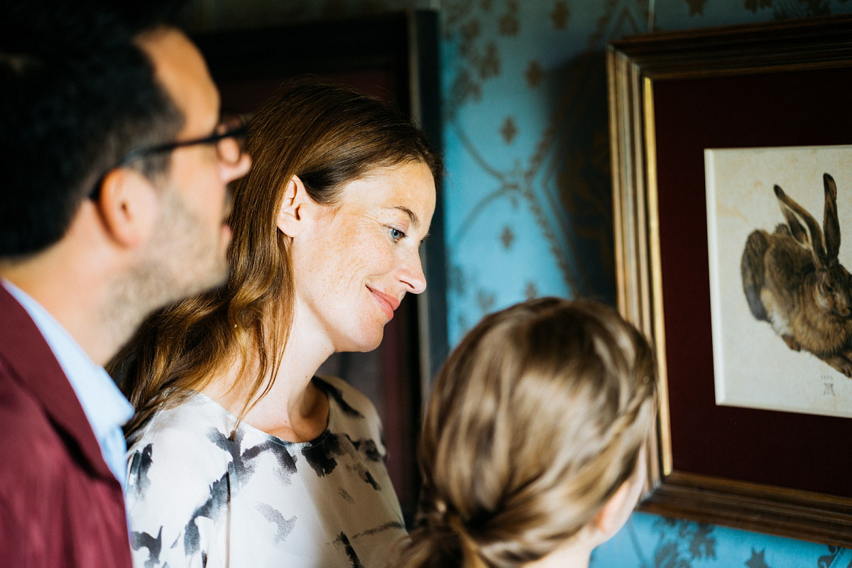 A family looking at the Dürer Hare
