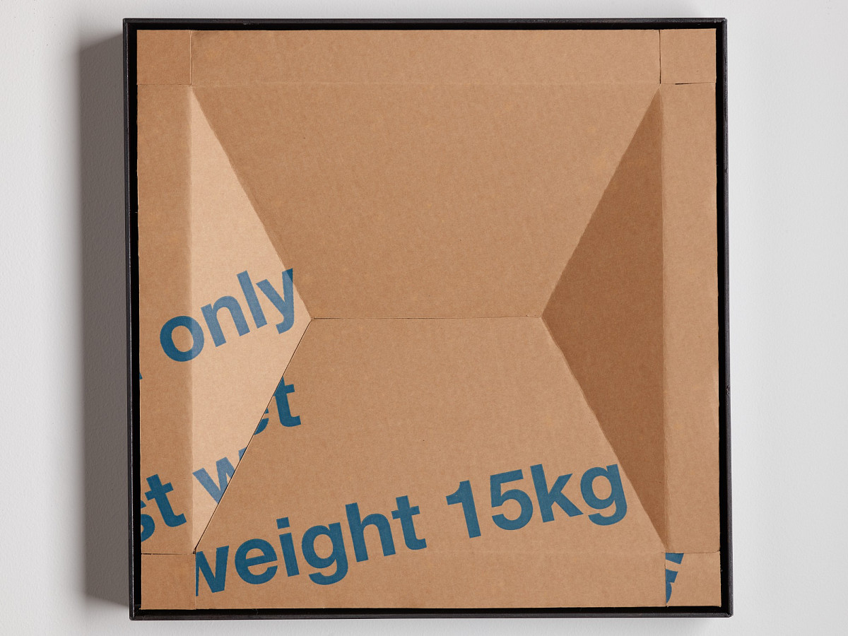 Square cardboard box with colorful print