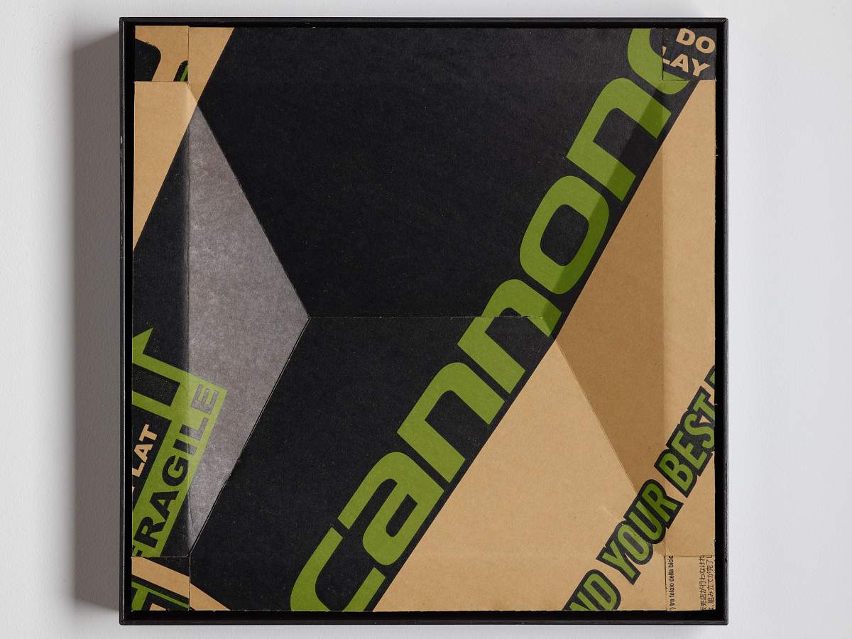 Square cardboard box with colorful print