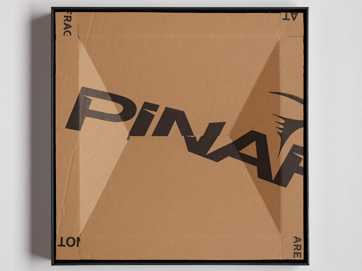 Square cardboard box with colorful print