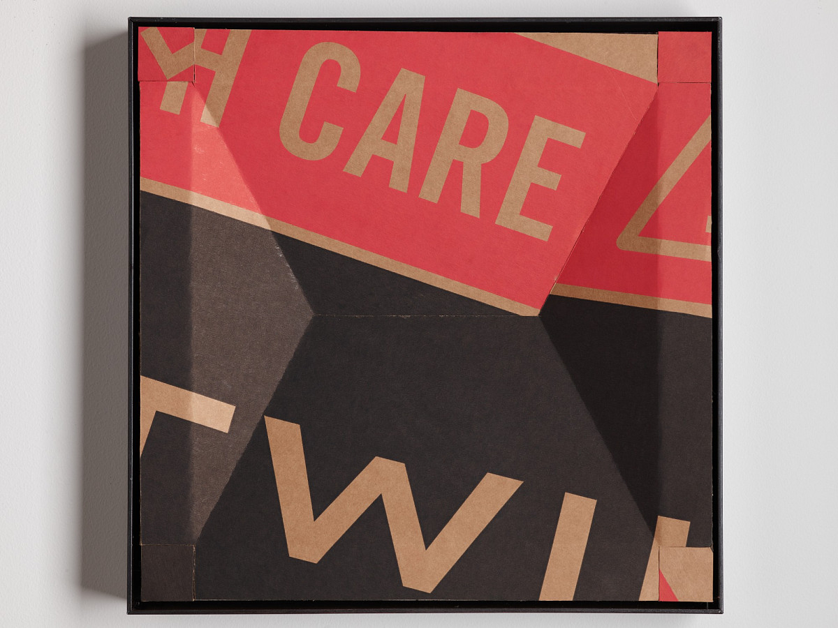 Square cardboard box with colorful print