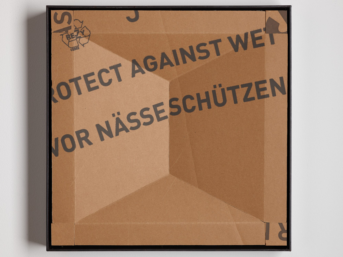 Square cardboard box with colorful print