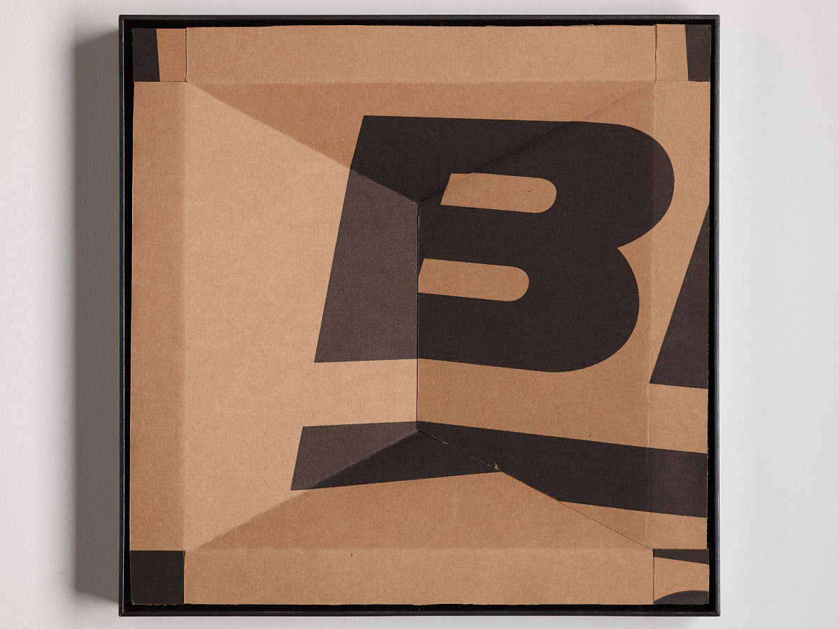 Square cardboard box with colorful print
